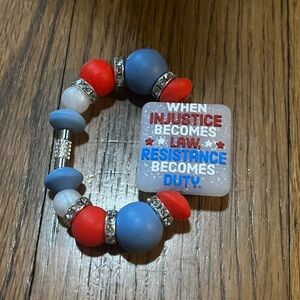 "When injustice becomes law, resistance becomes duty" beaded cup handle charm